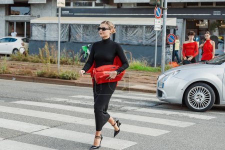 Photo for Veronica Ferraro wears all Ferragamo, outside Salvatore Ferragamo show during Milan Fashion Week Womenswear Spring/Summer 2024. - Royalty Free Image