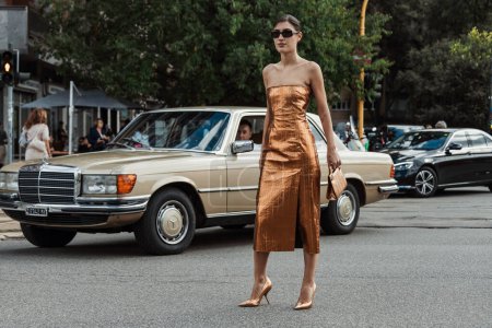Photo for Patricia Manfield wears all Ferragamo, outside Salvatore Ferragamo show during Milan Fashion Week Womenswear Spring/Summer 2024. - Royalty Free Image