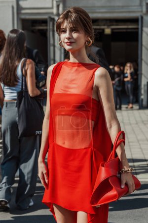 Photo for A guest outside Salvatore Ferragamo show during Milan Fashion Week Womenswear Spring/Summer 2024. - Royalty Free Image