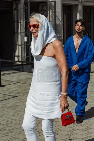 Photo for A guest outside Salvatore Ferragamo show during Milan Fashion Week Womenswear Spring/Summer 2024. - Royalty Free Image