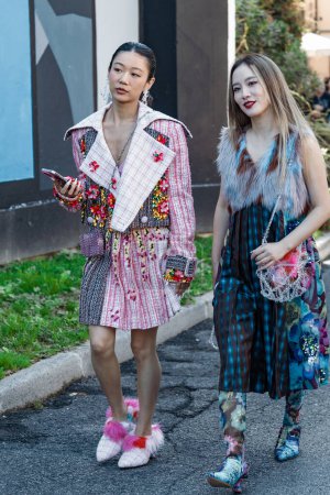 Photo for Guests wear all Shuting Qiu, outside Shuting Qiu show during Milan Fashion Week Womenswear Spring/Summer 2024. - Royalty Free Image