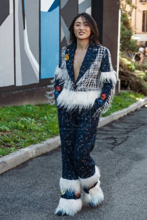 Photo for Sun XiaoYa wears all Shuting Qiu, outside Shuting Qiu show during Milan Fashion Week Womenswear Spring/Summer 2024. - Royalty Free Image