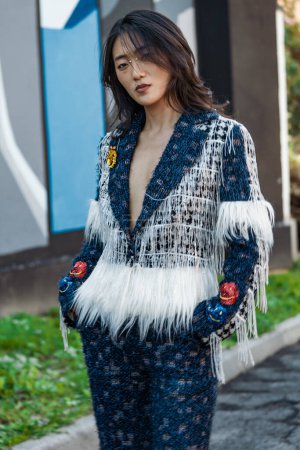Photo for Sun XiaoYa wears all Shuting Qiu, outside Shuting Qiu show during Milan Fashion Week Womenswear Spring/Summer 2024. - Royalty Free Image