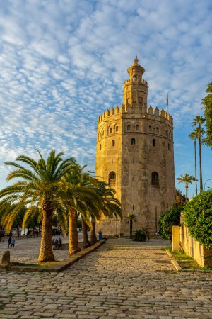 Photo for SEVILLA, SPAIN - JANUARY 1, 2023: Gold tower on sunset (Torre del Oro) in Sevilla, Spain on January 1, 2023 - Royalty Free Image