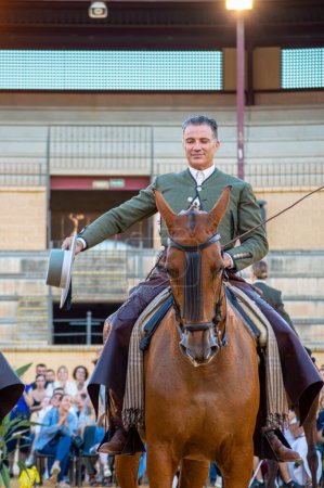 Photo for TORREMOLINOS, SPAIN - SEPTEMBER 30, 2023: Riders show on San Miguel fair in Torremolinos, Spain on September 30, 2023 - Royalty Free Image