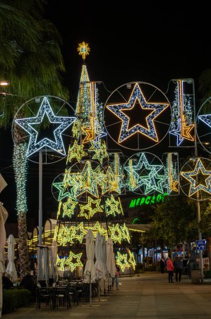 Photo for TORREMOLINOS, SPAIN - DECEMBER 14, 2023: Capture the festive charm of the Christmas lights and tree in Torremolinos, Spain on December 15, 2023 - Royalty Free Image