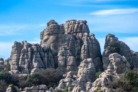 Hiking in the Torcal de Antequerra National Park, limestone rock formations and known for unusual karst landforms in Andalusia, Malaga, Spain.