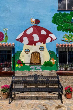 Photo for JUZCAR, SPAIN - APRIL 28 2024: Visiting of blue Smurfs Village in Juzcar, Spain on April 28, 2024 - Royalty Free Image
