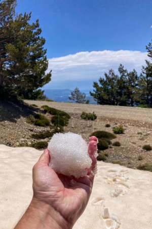 Melted snow on hiking trail to Mulhacen peak in the spring, Sierra Nevada range, Andalusia, Spain