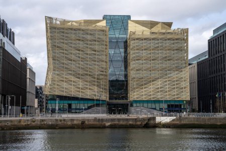 Photo for Dublin Docklands, Dublin 1 Ireland 29th March 2023. Central Bank of Ireland Office over the River Liffey view of building glass front - Royalty Free Image