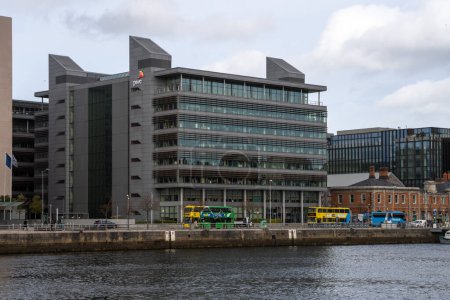 Photo for Dublin Docklands, Dublin 1, Ireland, 29th March 2023. PWC Tower Office block overlooking River Liffey. Price Waterhouse Cooper Dublin - Royalty Free Image