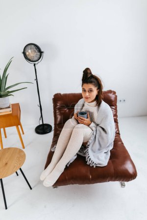 Photo for Close up photo sweet woman relaxing with hot beverage covered blanket wearing domestic home apparel clothes outfit sit comfy armchair - Royalty Free Image