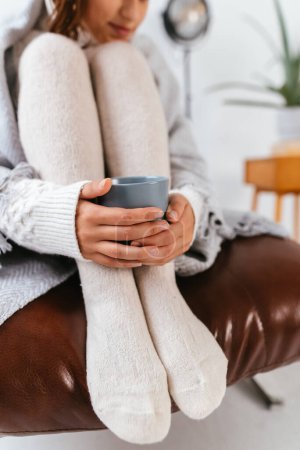 Photo for Close up photo sweet woman relaxing with hot beverage covered blanket wearing domestic home apparel clothes outfit sit comfy armchair - Royalty Free Image