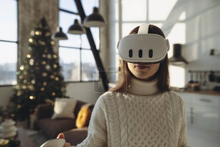 Photo for The beautiful girl in a virtual reality headset is expressing her experiences. High quality photo - Royalty Free Image