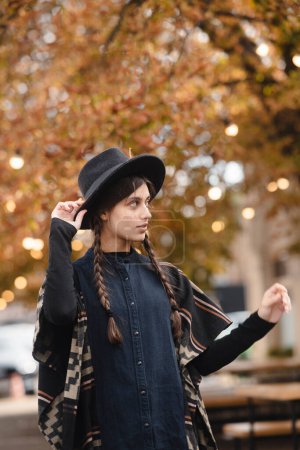 Photo for An enchanting depiction of a stylish woman embodying the essence of retro hippie fashion. High quality photo - Royalty Free Image