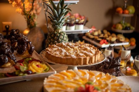 Holiday table with assorted luxurious desserts