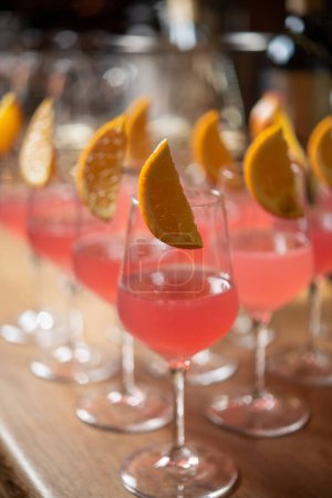 Photo for Cosmopolitan cocktails decorated with orange chunks - Royalty Free Image