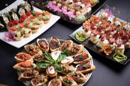 Photo for Festive antipasti served on big platters - Royalty Free Image