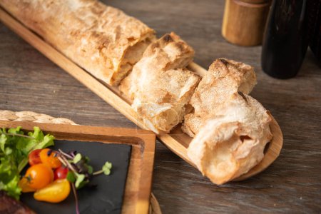 Photo for Closeup view of sliced baguette with crunchy crust - Royalty Free Image