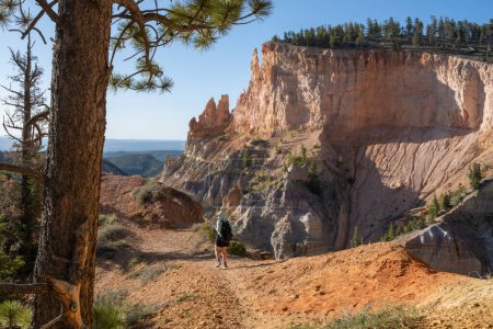Woman Hikes the Under the Rim Trail in Bryce Canyon National Park