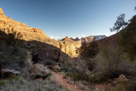 Photo for Hiker Passing The End of Travertine Canyon in the Grand Canyon - Royalty Free Image