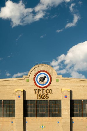 Photo for Gardiner, United States: July 21, 2022: YPT CO Sign Below Blue Sky and Puffy Clouds - Royalty Free Image