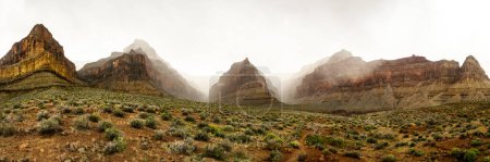 Photo for Vesta Temple Flanked By Whites Butte and Marsh Butte With A Winter Storm Coming Over The Rim of the Grand Canyon - Royalty Free Image