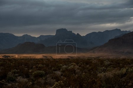 Sun Fills The Valley Below With The Chisos Mountains In Shadow in Big Bend