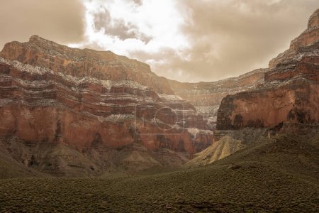 Snow Clings To The Cliffs Above Monument Creek in Grand Canyon