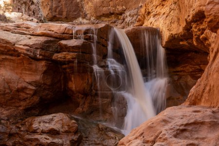Water Pours Over Cliff Edge in Sulphur Creek in Capitol Reef National Park