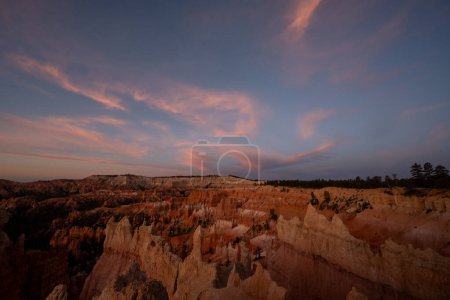 Wispy Clouds Glow Pink Over Bryce
