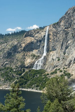 Tueeualal Falls Rushes Down Cliff to Hetch Hetchy in Yosemite