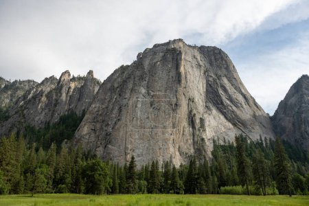 El Capitan Rises Above Green Fields of Yosemite Valley in Summer