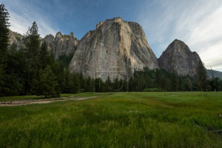 Middle Cathedral Rock Rises Sharply Over Yosemite Valley in Summer