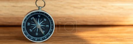 Photo for Banner of compass on wooden background with copy space using as direction - Royalty Free Image