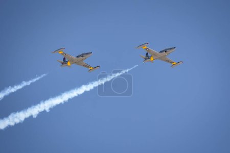 Photo for Ace Maker Aviation's T-33 Shooting Star team performs at the 2023 Thunder and Lightning Over Arizona in Tucson, Arizona. - Royalty Free Image