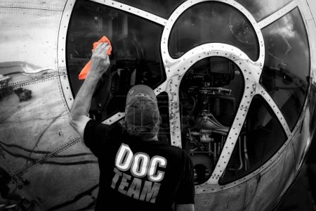 Photo for The nose of a B-29 Superfortress, named Doc, is being prepared for visitors by the Doc Team at America's Airshow 2023 in Miramar, California. - Royalty Free Image