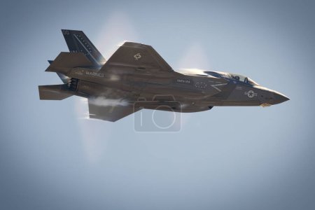Photo for Vapor breaks around an F-35 Lightning II at America's Airshow 2023 in Miramar, California. - Royalty Free Image