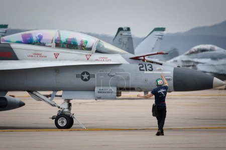 Photo for An F-18 Hornet gets ready on the tarmac for take-off at America's Airshow 2023 in Miramar, California. - Royalty Free Image