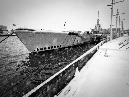 Photo for The USS Cobia (SS245), during a snowstorm, and part of the Wisconsin Maritime Museum in Manitowoc, Wisconsin. - Royalty Free Image
