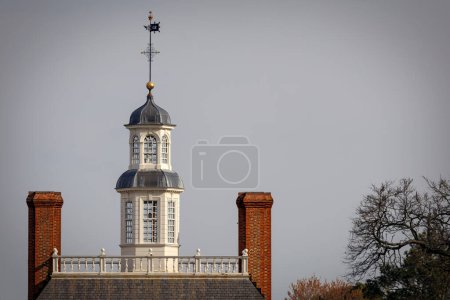 Photo for The tower and chimneys of the Governor's Palace in Colonial Williamsburg, Virginia. - Royalty Free Image