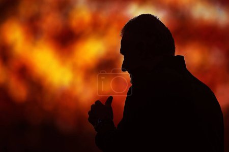 Photo for Rio de Janeiro, Brazil, May 11, 2024. Silhouette of the football coach Tite of the Flamengo team, during a match against Corinthians, for the Brazilian champion, at the Maracan stadium. - Royalty Free Image