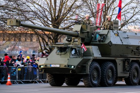 Riga, Latvia - November 18, 2022: Slovak 155 mm Gun Howitzer Zuzana in the army parade in the capital of Latvia, Riga. Defocused. High quality photo