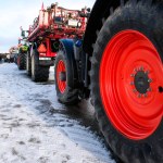 Bauska, Latvia - February 5, 2024: Farmers protests in the Latvian city of Bauska. Farmers block traffic in the city with tractors. High quality photo