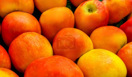 Photo for Pile of ripe apples in box, closeup view - Royalty Free Image