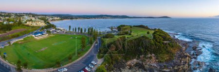 Photo for Aerial sunrise panorama over The Haven and Terrigal Sports Ground from The Skillion at Terrigal on the Central Coast, NSW, Australia. - Royalty Free Image