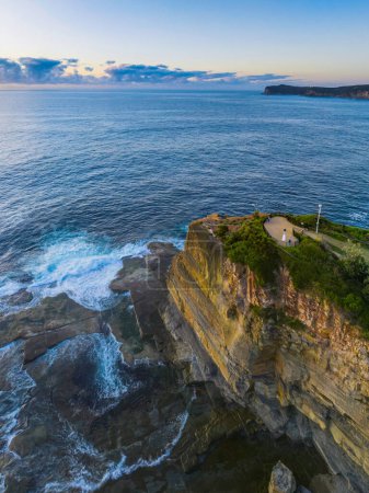Photo for Aerial sunrise sea views over The Skillion at Terrigal on the Central Coast, NSW, Australia. - Royalty Free Image