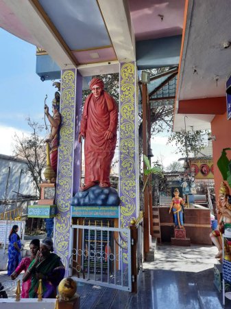 Photo for Bangalore, Karnataka, India-Jan 15, 2023: Closeup of beautiful Jodi Veerabhadra Swamy Temple and Shivakumara Swamiji, Jagadguru Veera Gangadhara Rajadeshi Kendra Swamiji Statue - Royalty Free Image