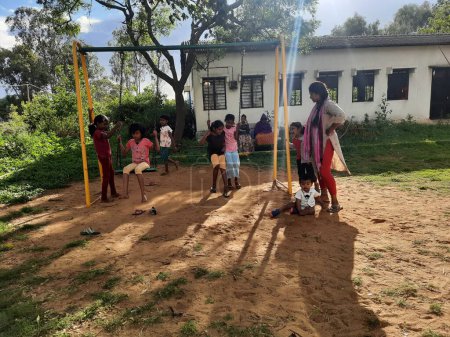 Photo for Bangalore, Karnataka, India-June 10 2023: Closeup of beautiful and real kids sport equipment in the park and playing together at Machohalli Forest Gate - Royalty Free Image