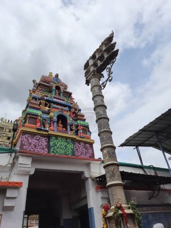 Photo for Doddaballapur, Karnataka, India-June 24 2023: Closeup of beautiful Shri Ghati Subrahmanya Temple entrance tower and dwajastambha. - Royalty Free Image